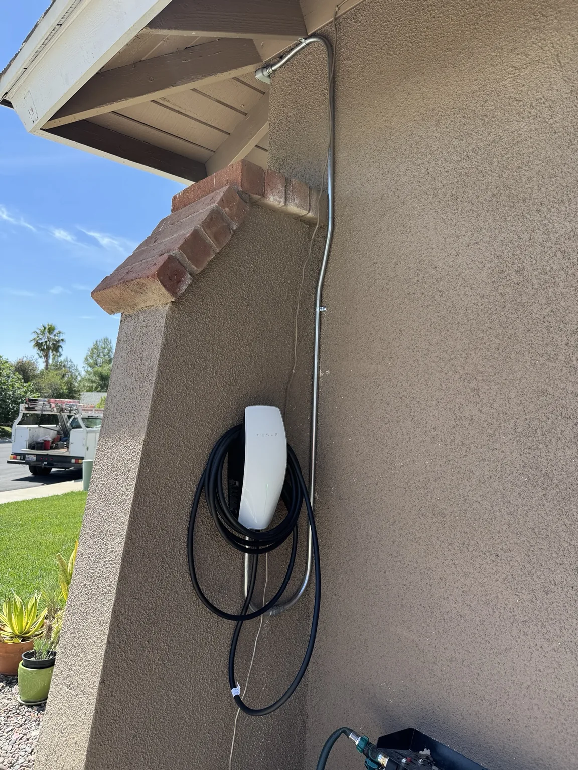 Outdoor Tesla wall connector installation